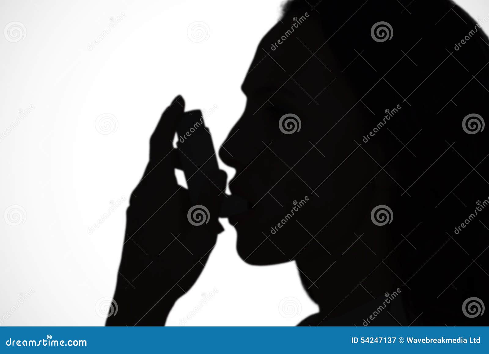 composite image of asthmatic brunette using her inhaler