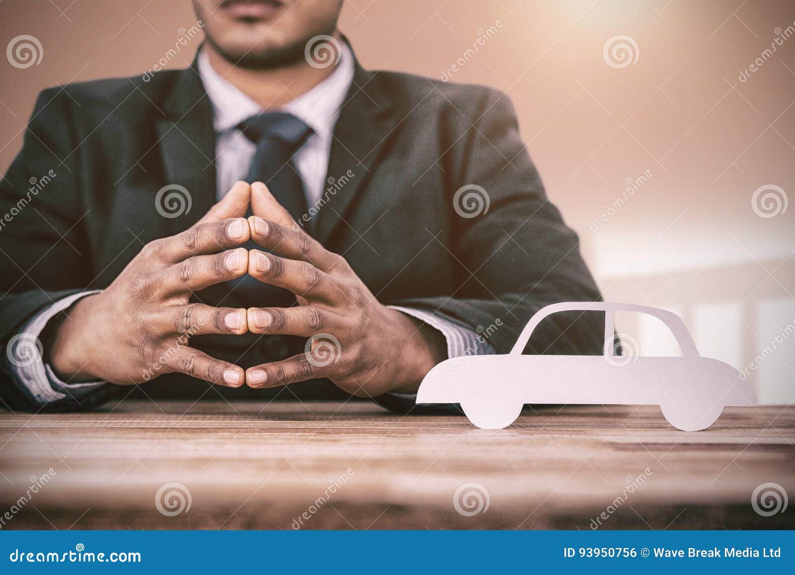 Composite Image Of Business Man Sitting Behind A Desk Stock Photo