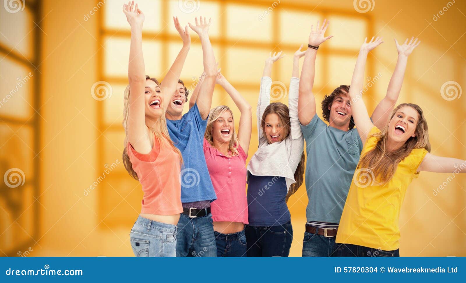 Composite Image Of A Jumping Happy Group Cheering Stock Photo Image