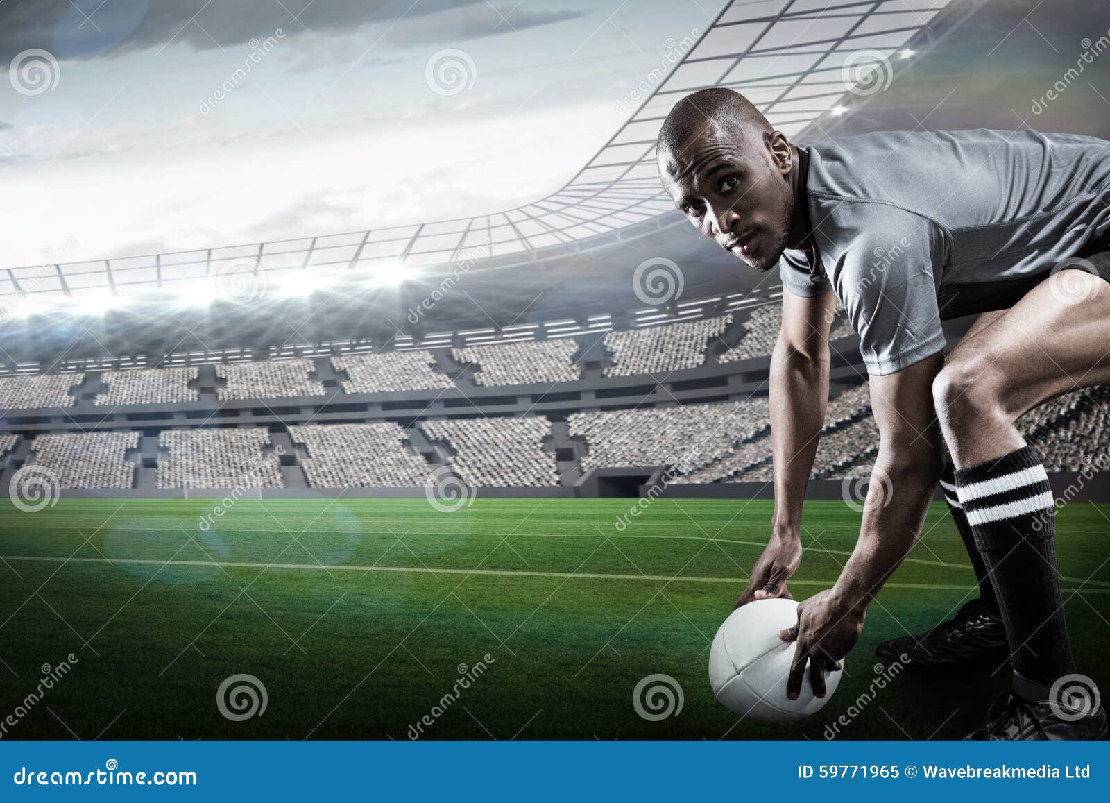 Portrait Of Rugby Player Wearing Helmet With Arms Crossed RoyaltyFree Stock Photo