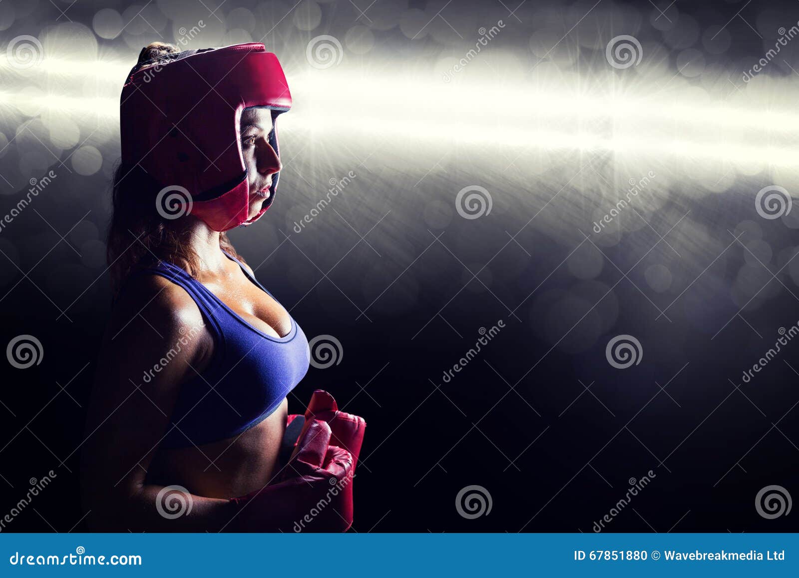 Composite Image of Side View of Female Boxer with Headgear and Gloves