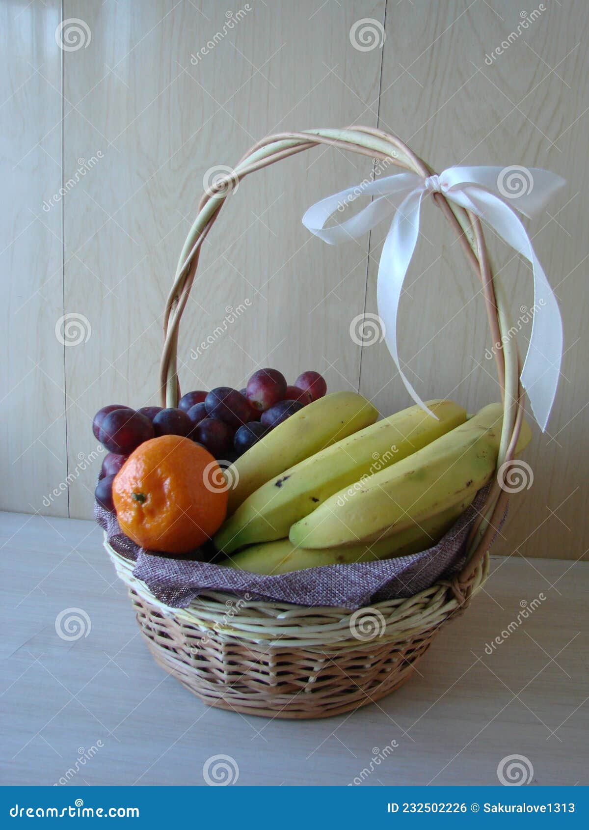 Composition with Assorted Fruits in Wicker Basket Isolated on White