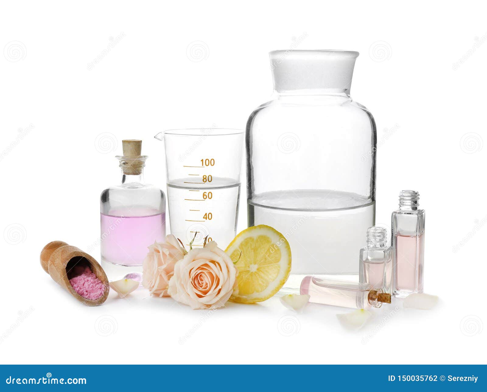Composition with Bottles of Essential Oils, Ingredients and Laboratory Glassware on White