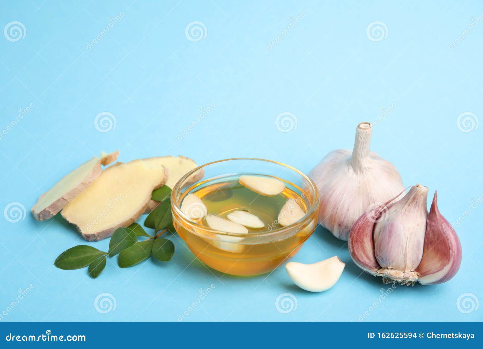 Composition with Garlic and Other Cold Remedies on Background Stock