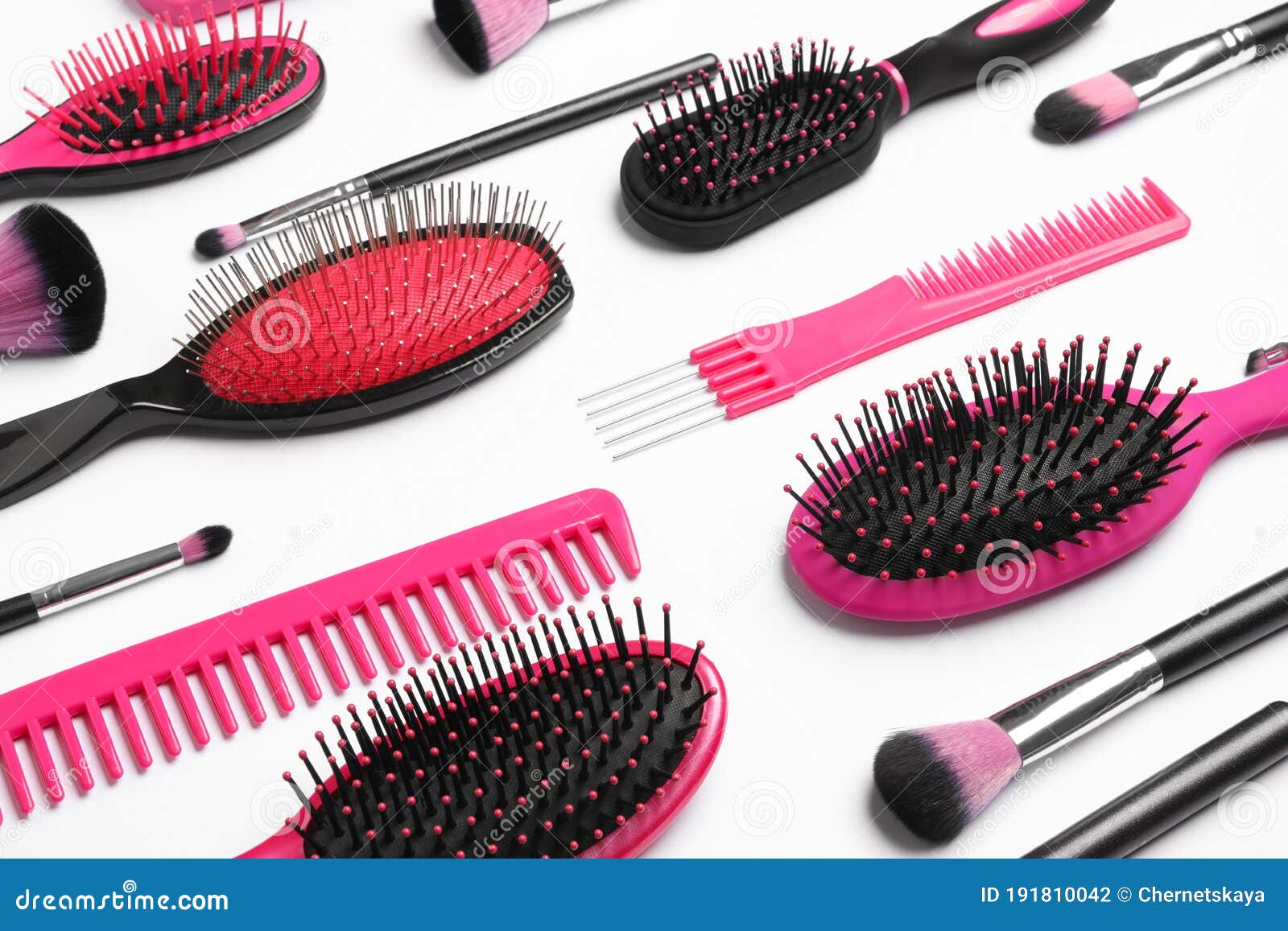 Composition with Hair Combs and Brushes on Background Stock Photo