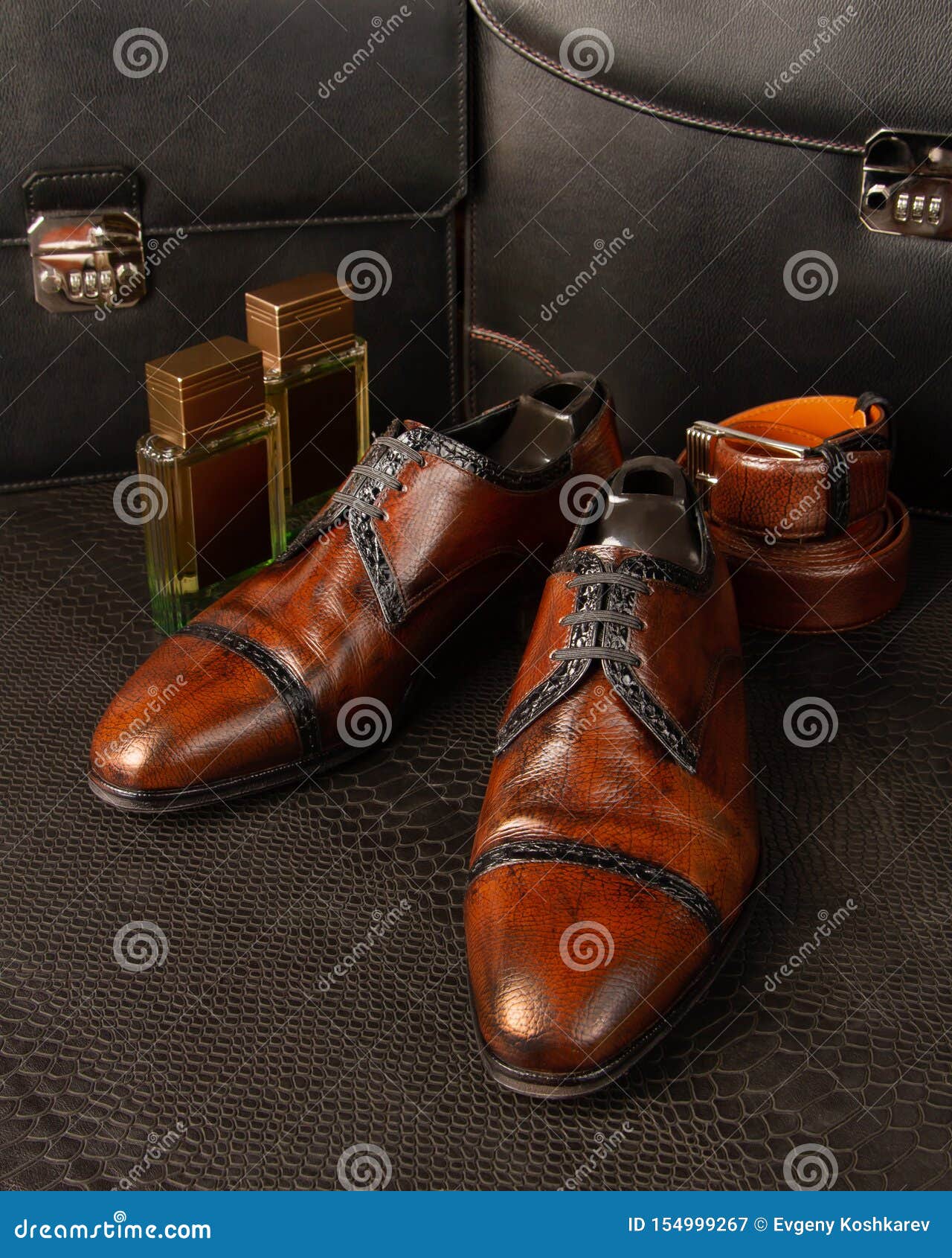 Composition of a Pair of Men`s Brown Shoes, Two Bottles of Men`s ...