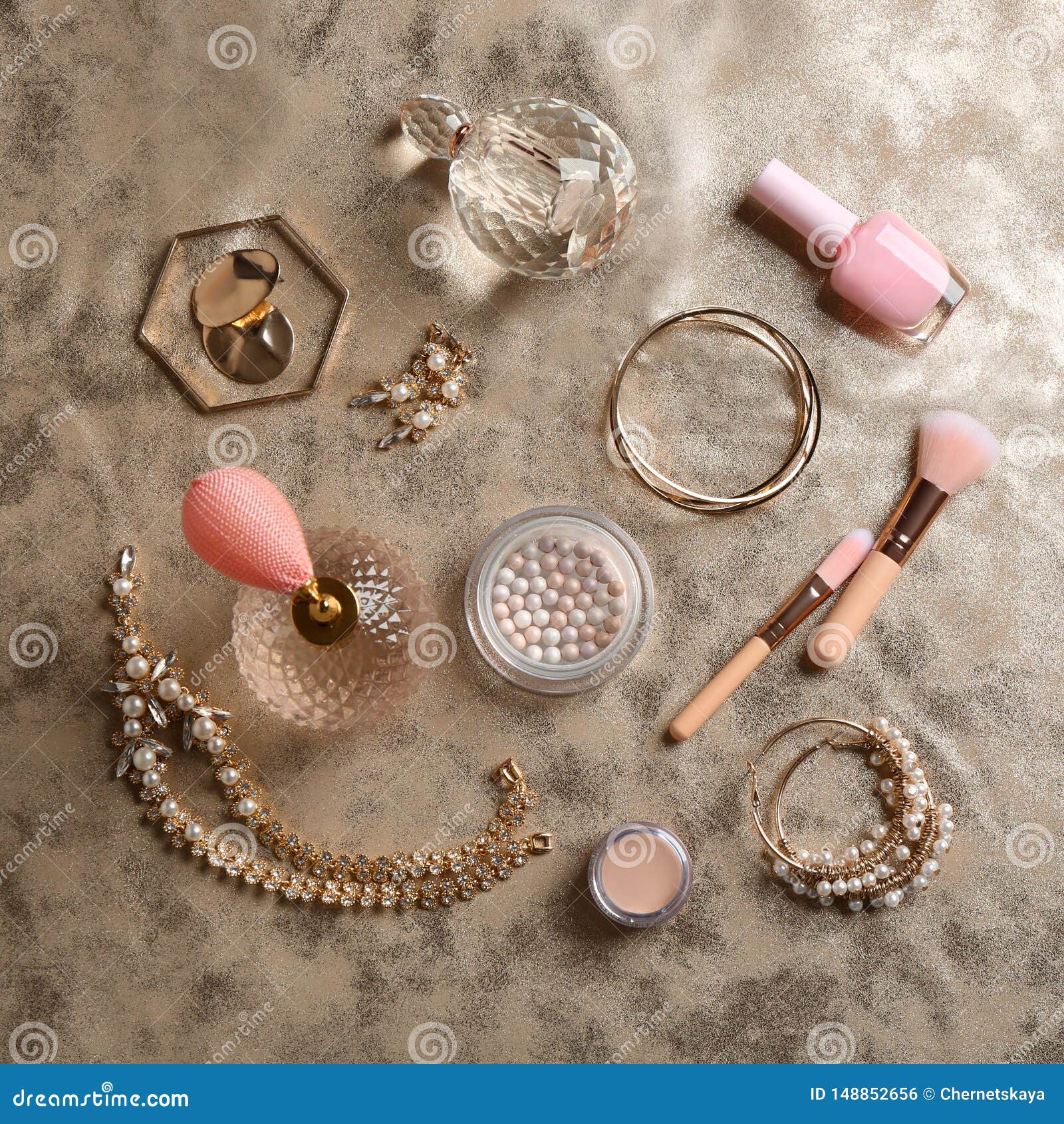 Composition with Perfume Bottles, Cosmetics and Jewellery on Fabric ...