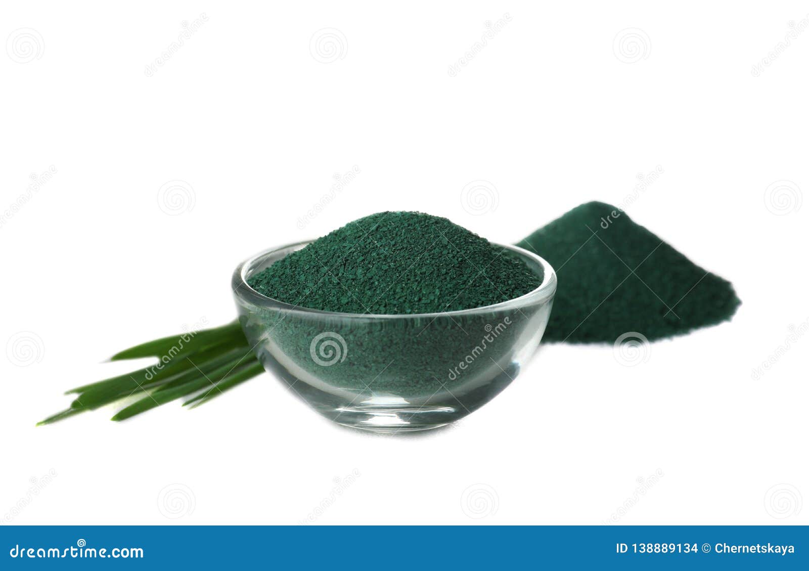 Composition with Spirulina Algae Powder and Grass on White Stock Photo