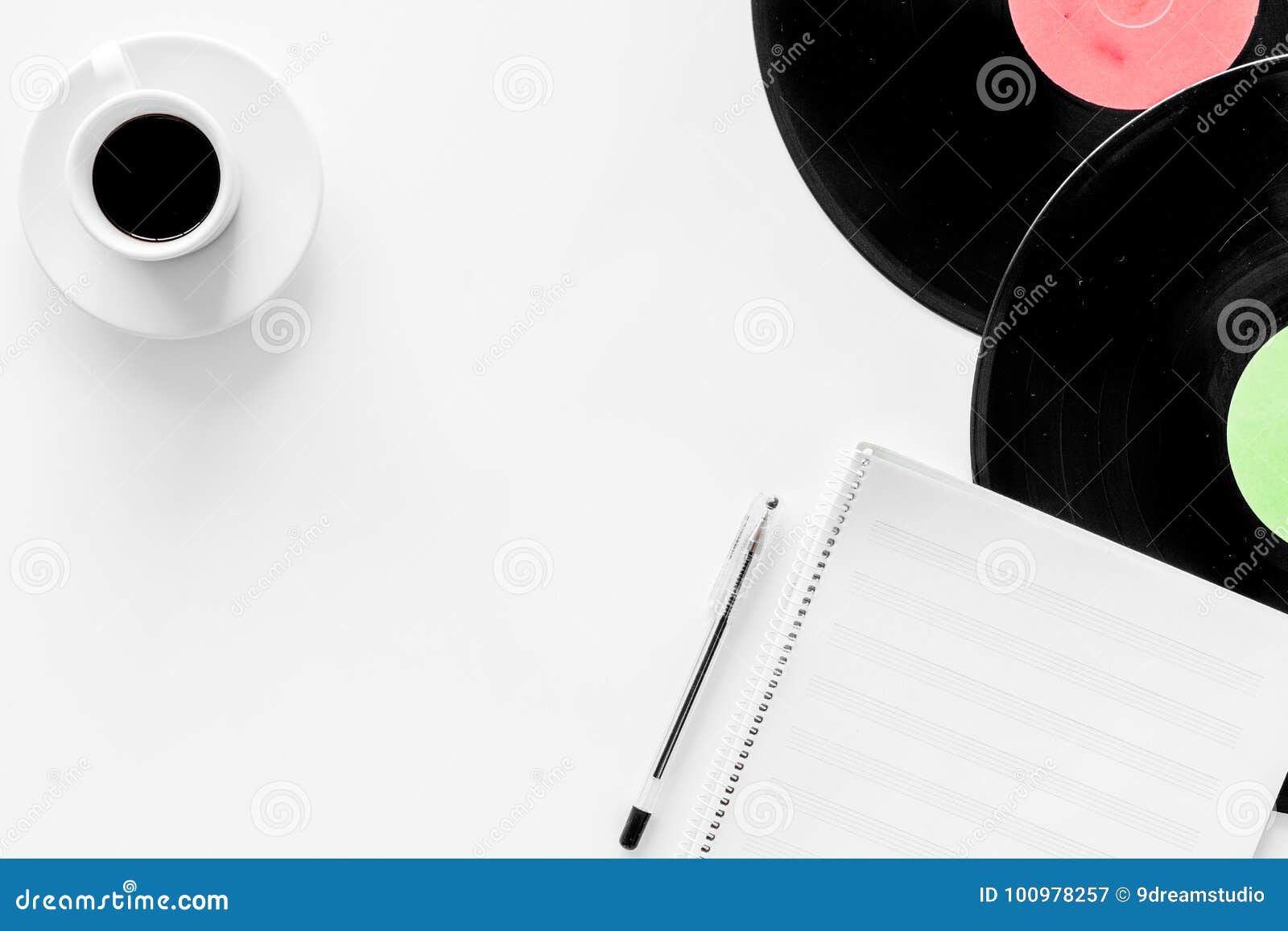 compositor`s workplace. vinyl records and music notes on white background top view copyspace
