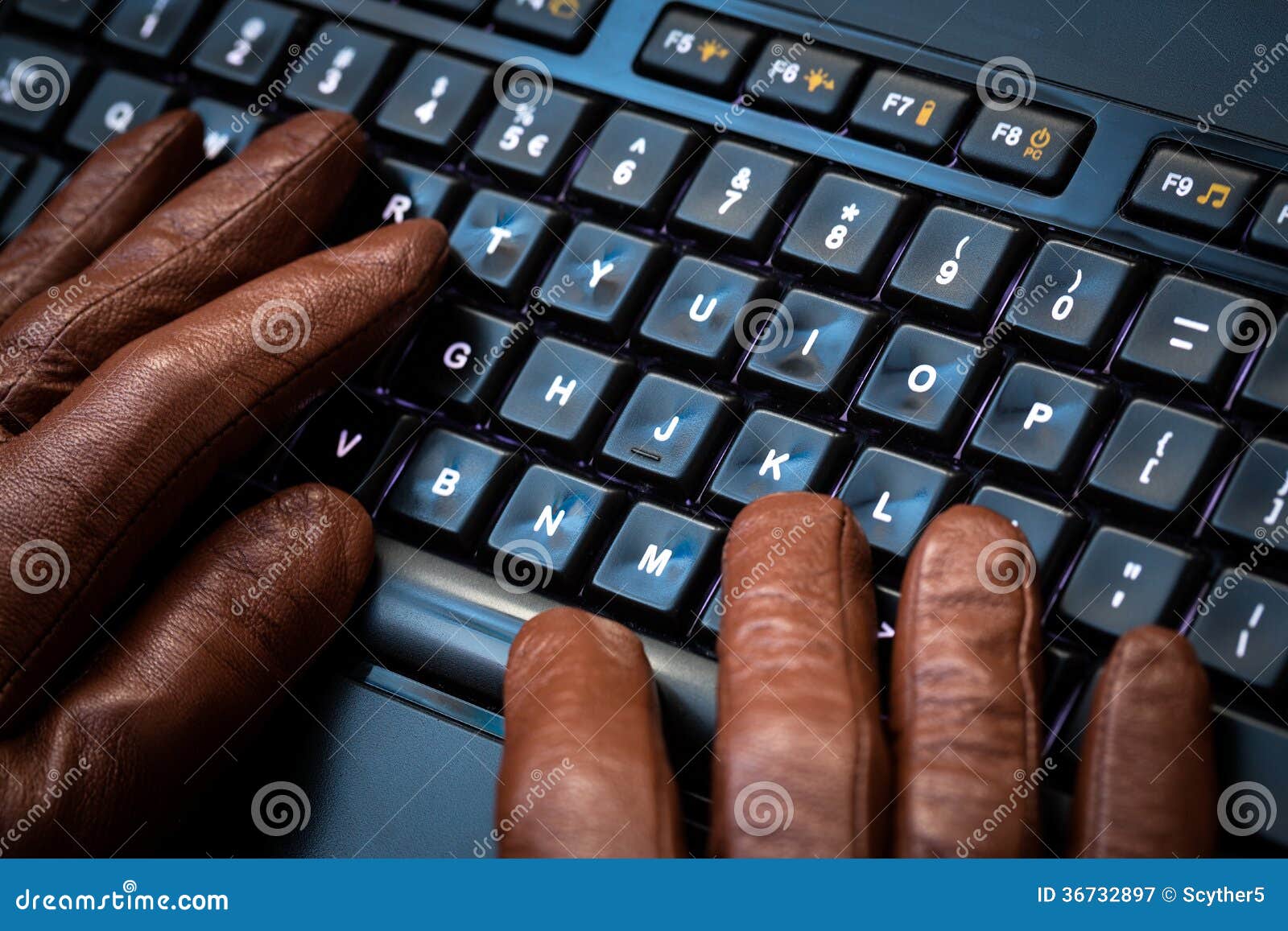 Computer crime concept. Hacker using laptop. Lots of digits on the computer screen.