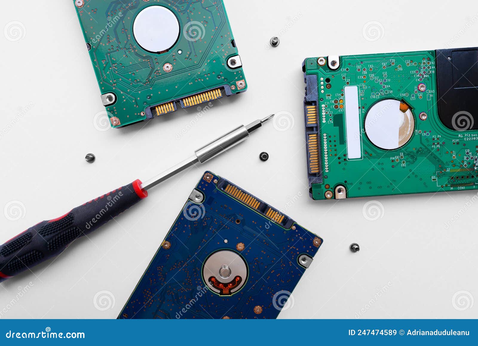 Hard drive and screwdriver stock image. Image of white 247474589