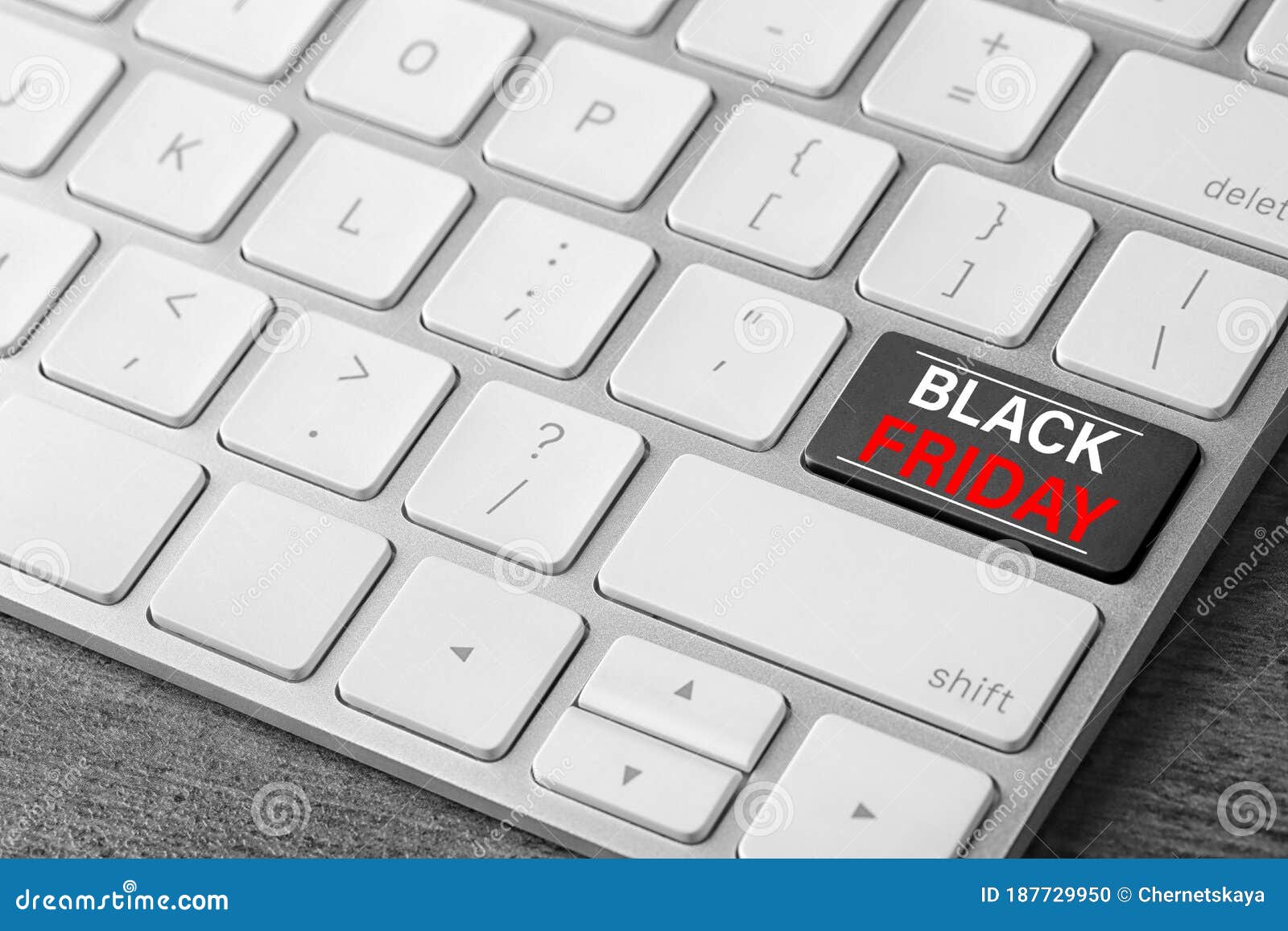 Computer Keyboard with Black Friday Button. Online Shopping Stock Photo