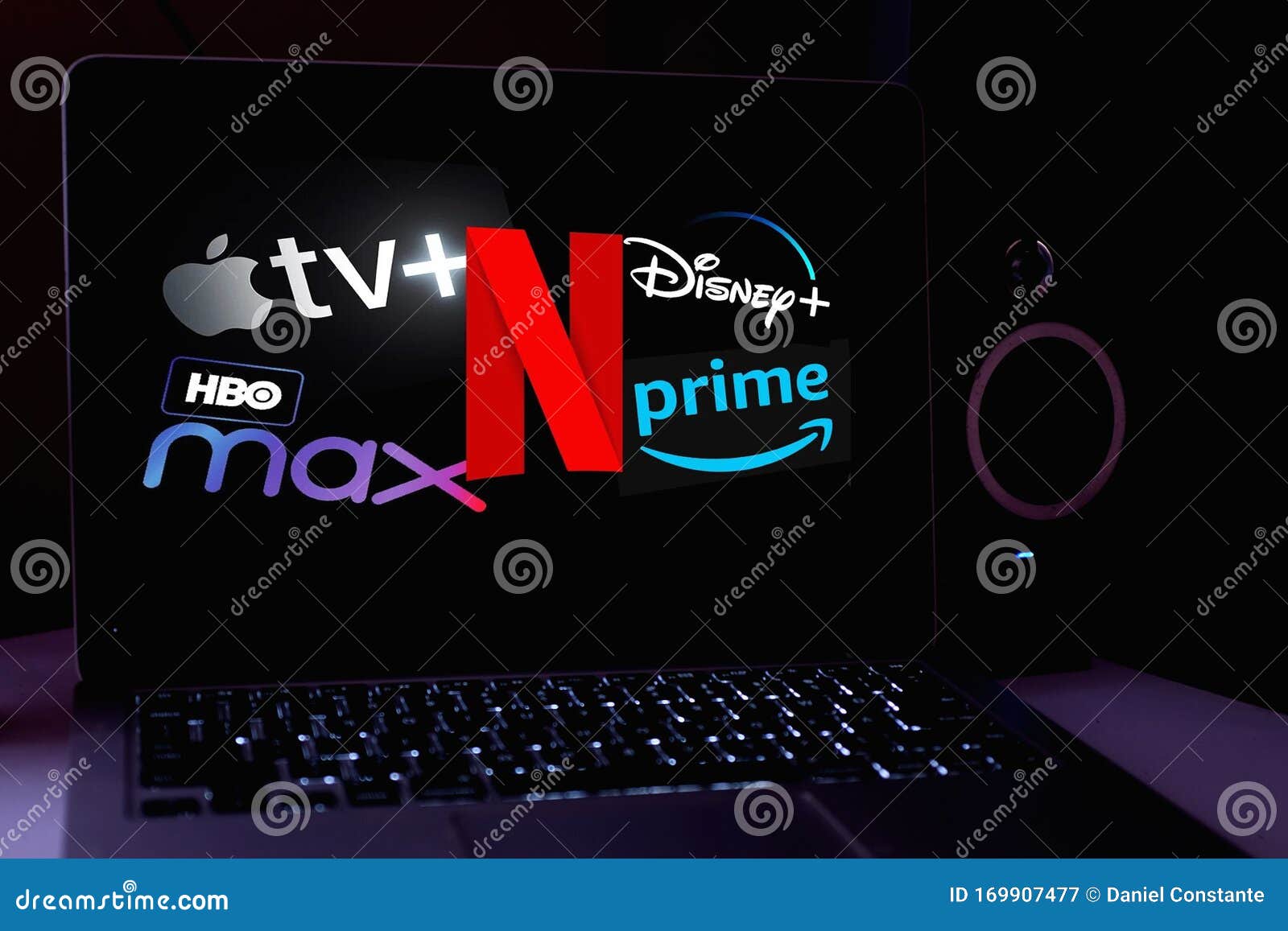 Computer with Logo Netflix , HBO MAX, APPLE TV PLUS, NETFLIX, PRIME VIDEO are Online Video Streaming Services
