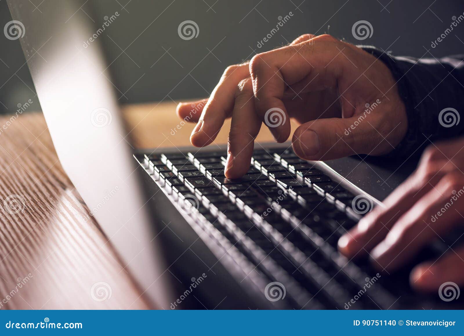 computer programmer and hacker hands typing laptop keyboard