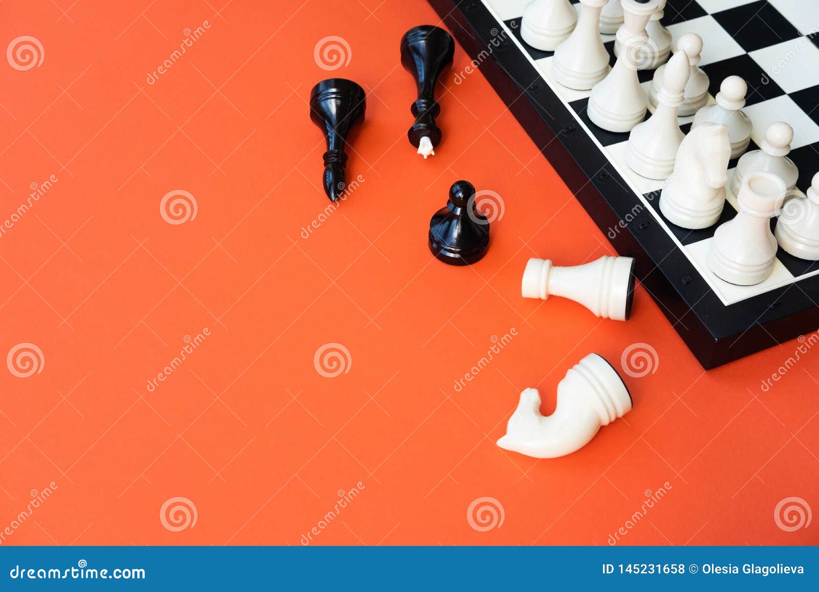 Chess Game Concept. Chess Board with Figures on Orange Background