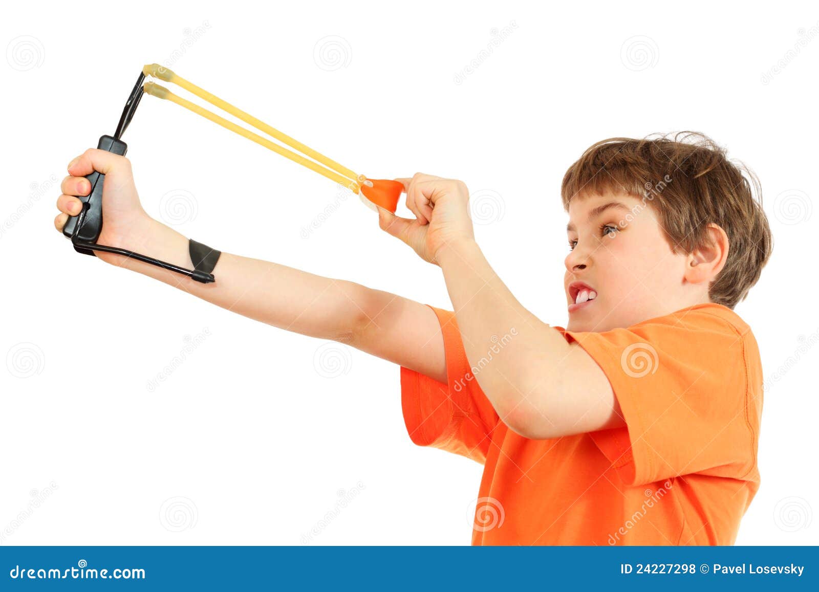 concentrated boy with slingshot aim