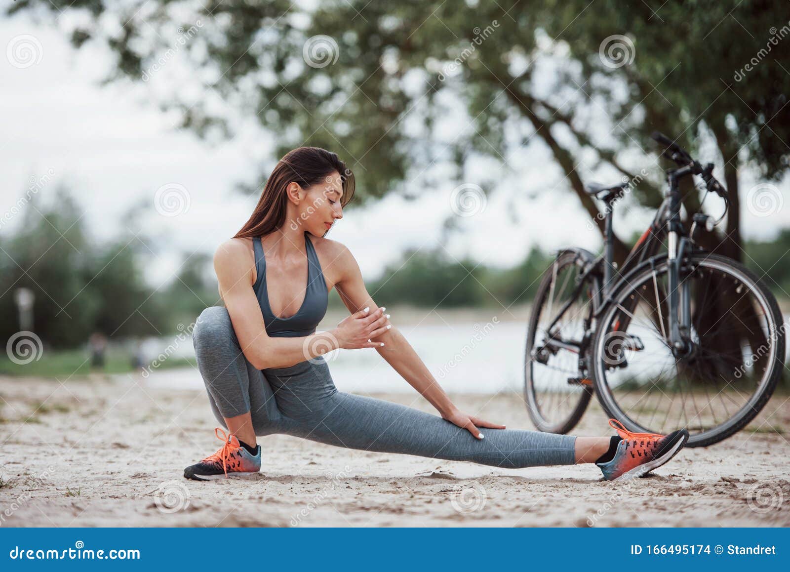 This exercise will make you more flexible. Female cyclist with