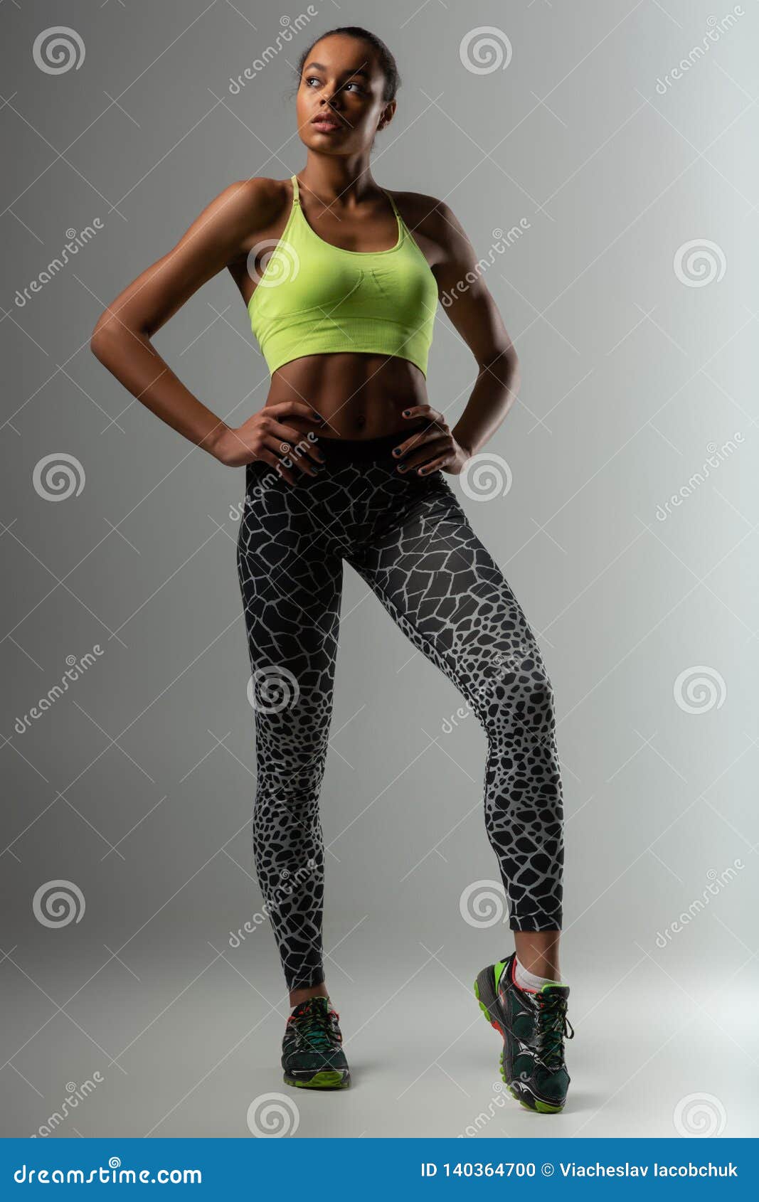 Fit healthy young woman with a strong body