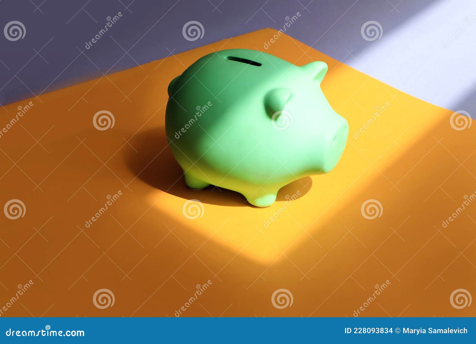 the concept of accumulation of financial resources. piggy bank in the  of a pig on different backgrounds-yellow and lilac, in