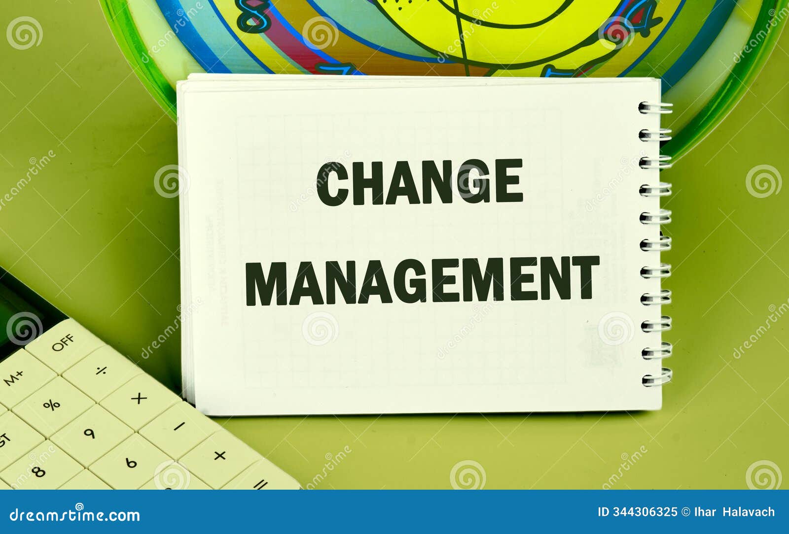 the concept of business and development. conceptual text, phrase, words change management in the notebook, front view