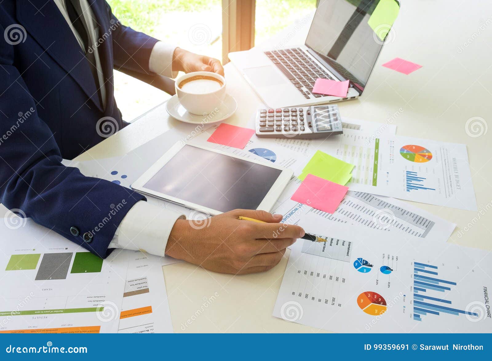 Concept of a Business Man Analyzes Data Online with the Internet Stock Concept of a Business Man Analyzes Data Online with the Internet Stock