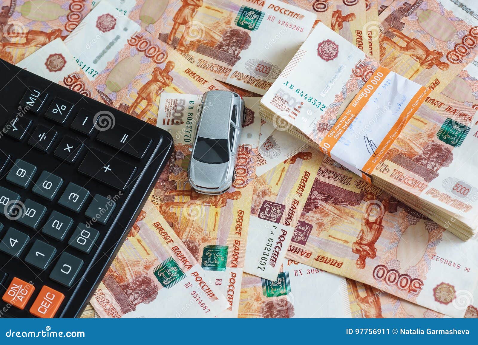 the concept of buying a car model cars a calculator and a car buying calculator