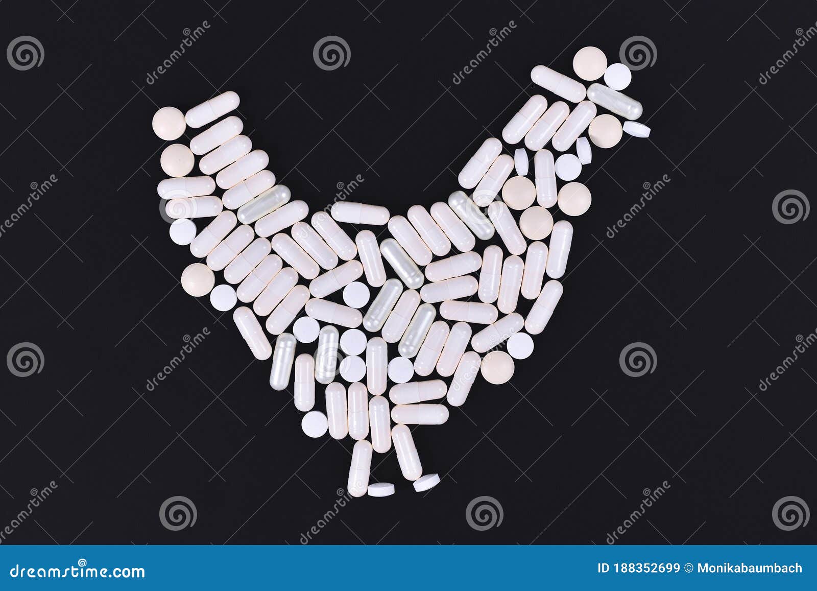 concept for chicken meat contaminated with harmful antibiotics residues showing  of chicken made up by pills