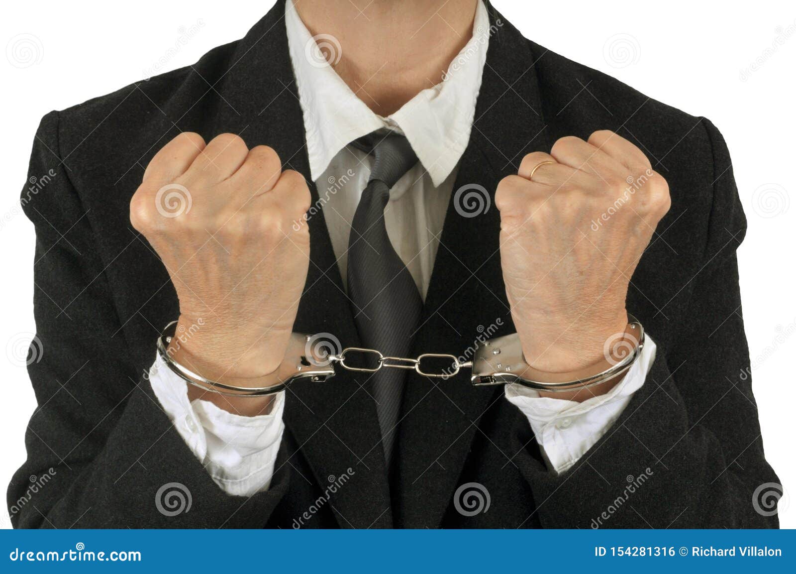 Handcuffed man in closeup stock photo. Image of handcuffs 154281316