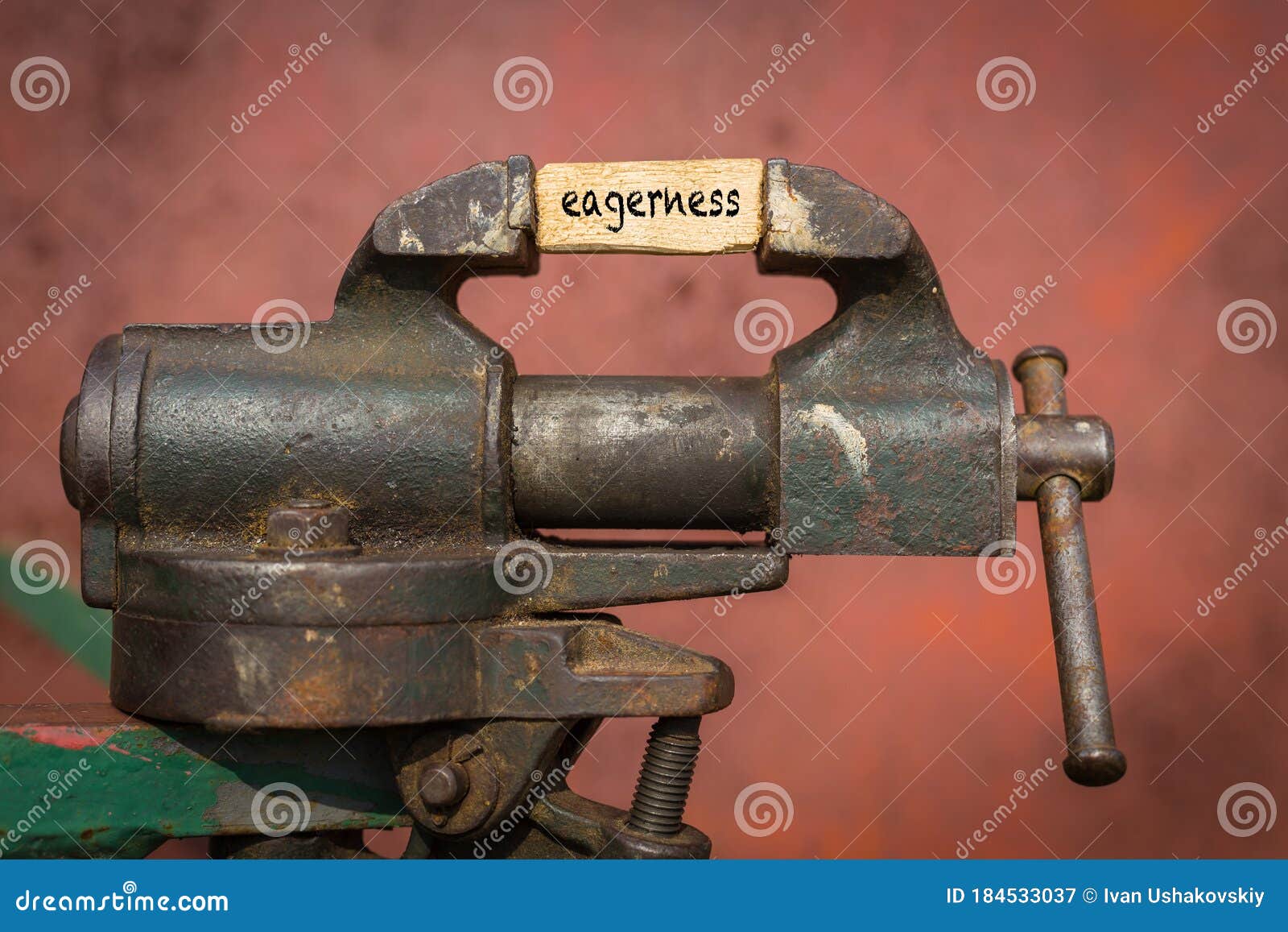 vice grip tool squeezing a plank with the word eagerness