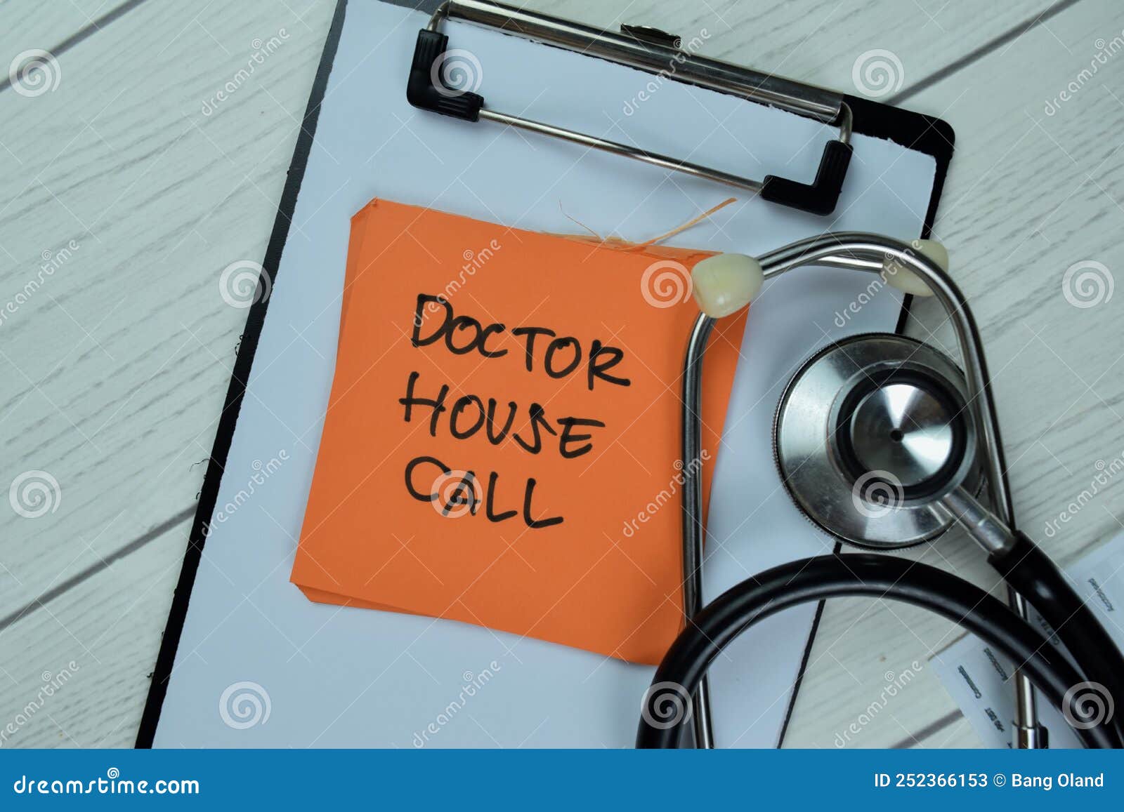 Concept of Doctor House Call Write on Sticky Notes Isolated on Wooden