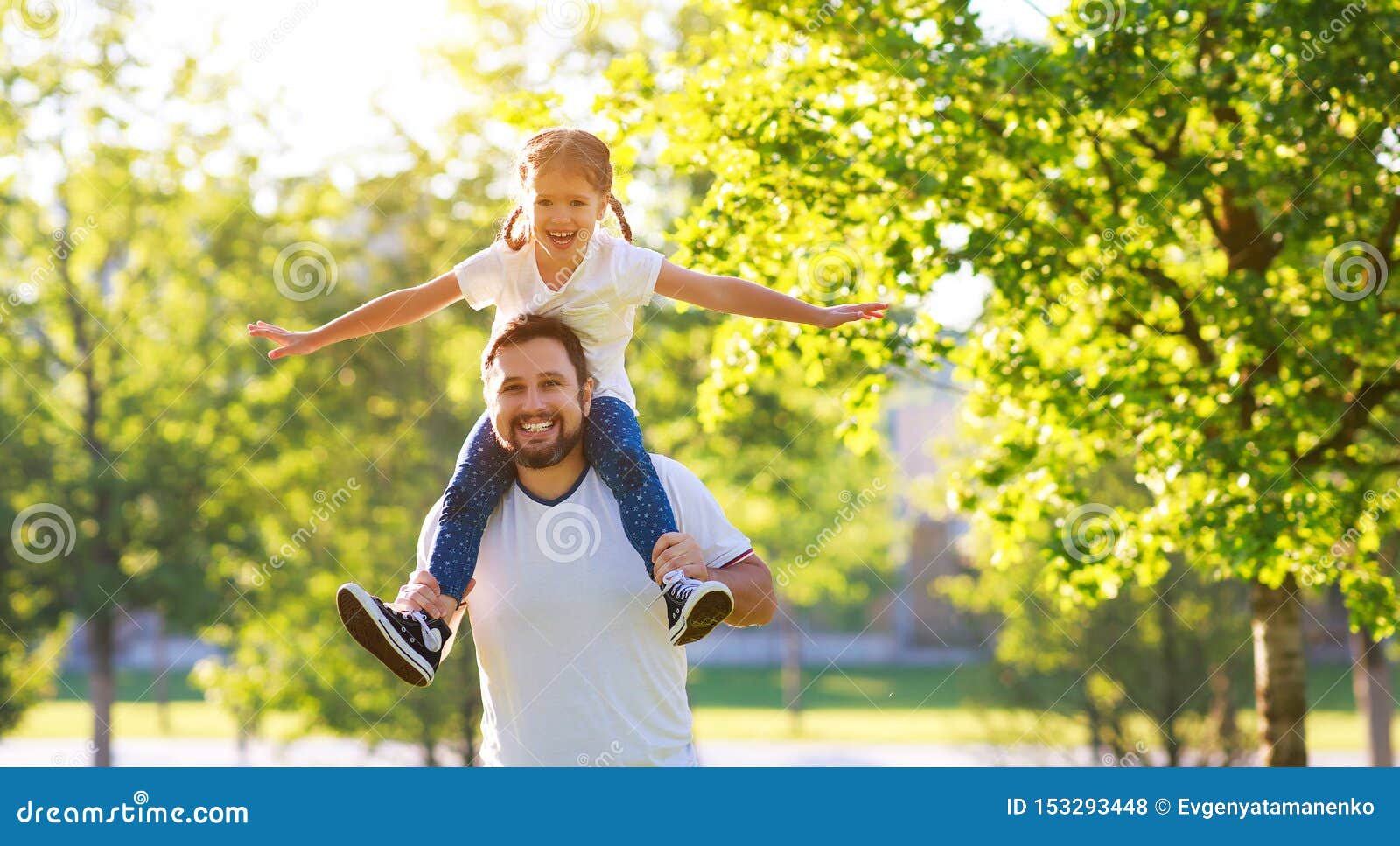 concept of father`s day! happy family dad and child daughter    in nature