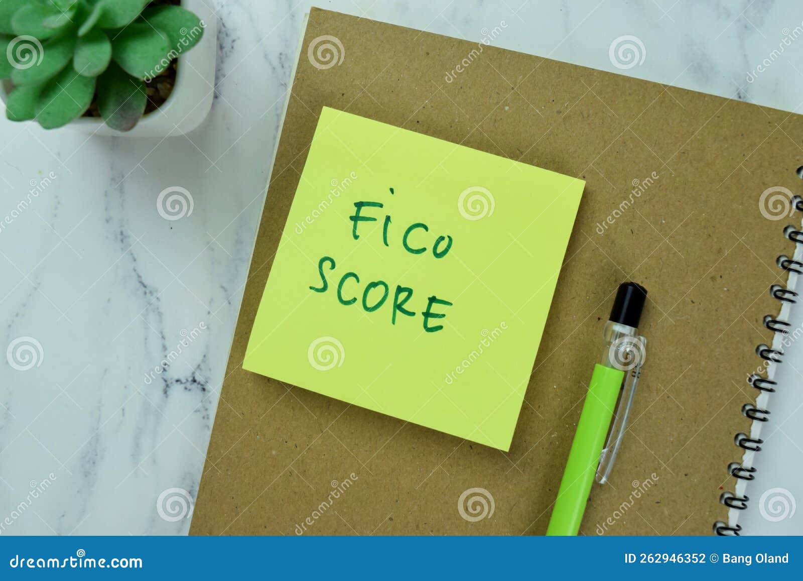 concept of fico score write on sticky notes  on wooden table