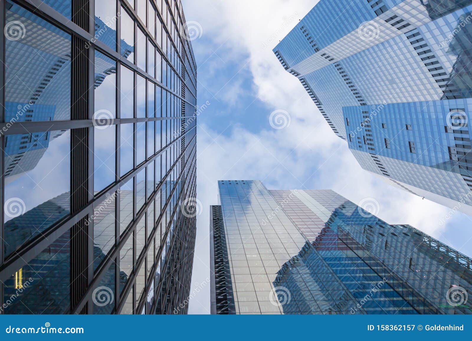concept of financial economics future. business offices skyscrapers on blue sky background
