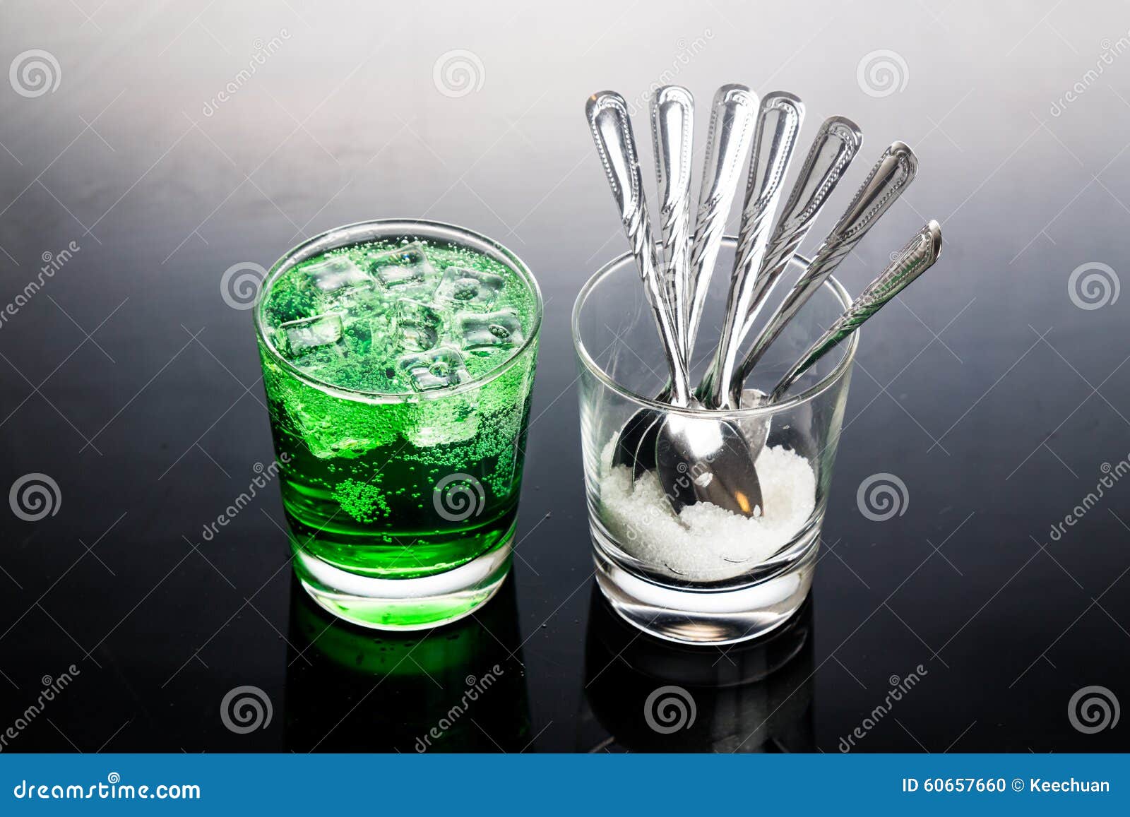Concept of Green Fizzy Drinks with Unhealthy Sugar Content Stock Photo