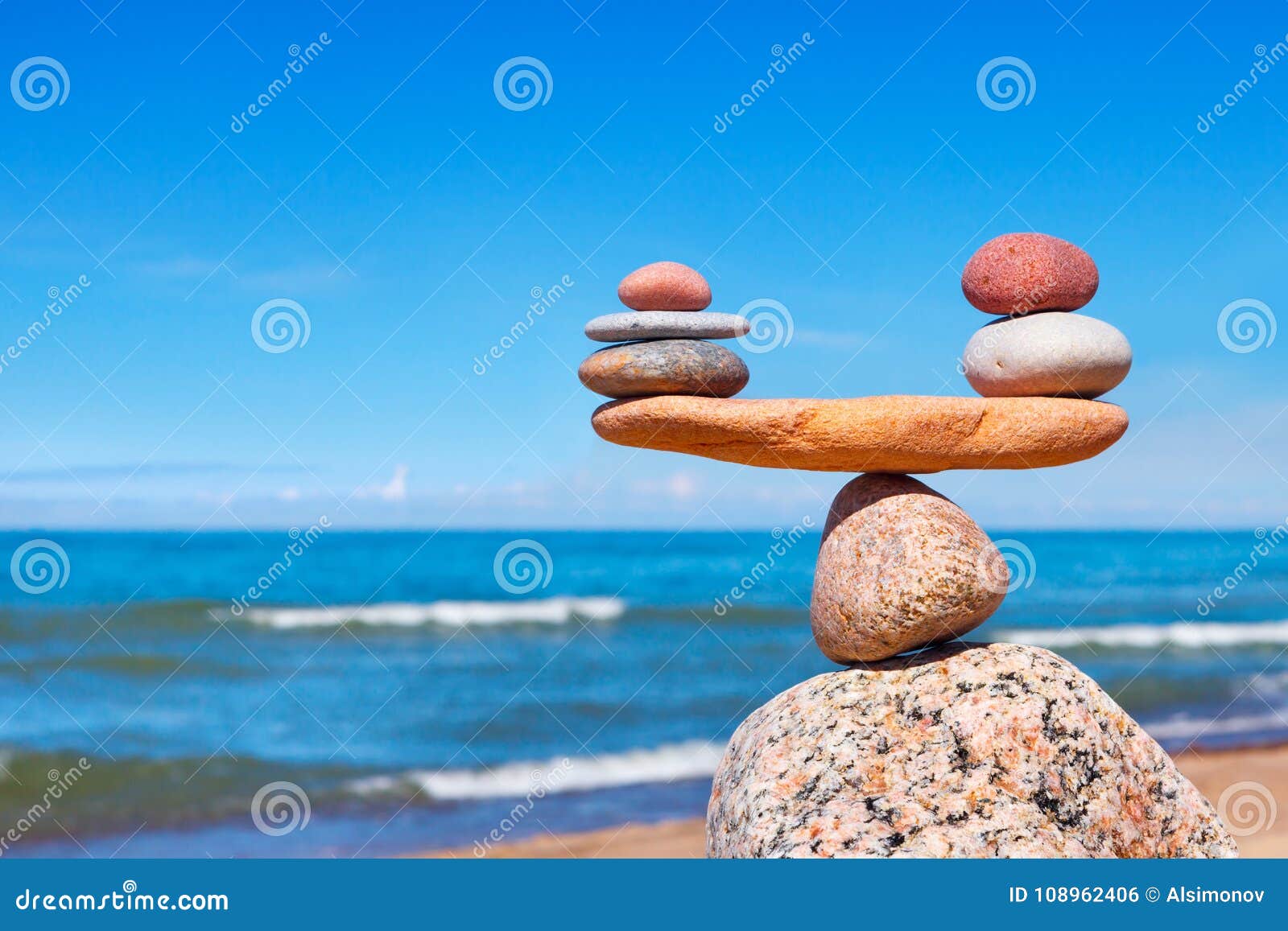 concept of harmony and balance. balance stones against the sea.