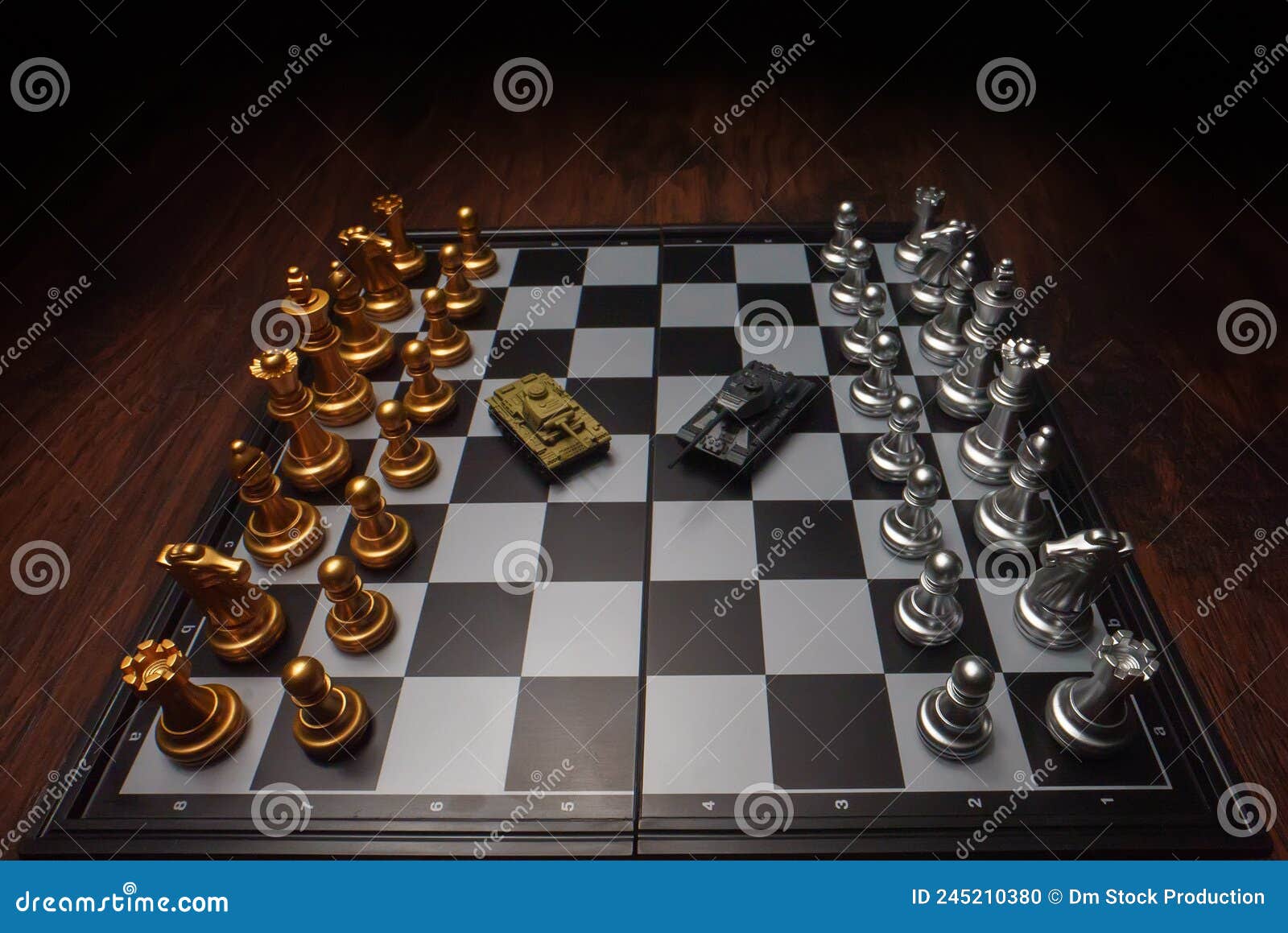 Toy tanks with chess on chessboard. Concept of military strategy., Stock  image