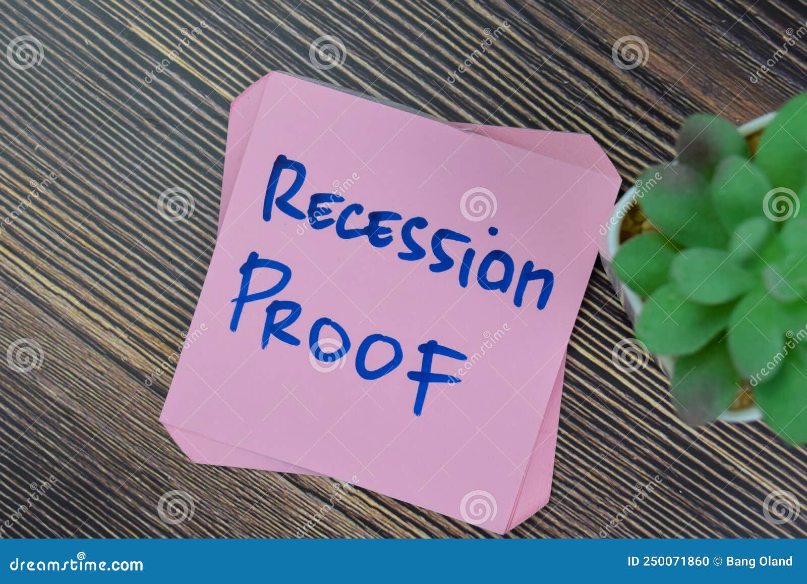 concept of recession proof write on sticky notes  on wooden table
