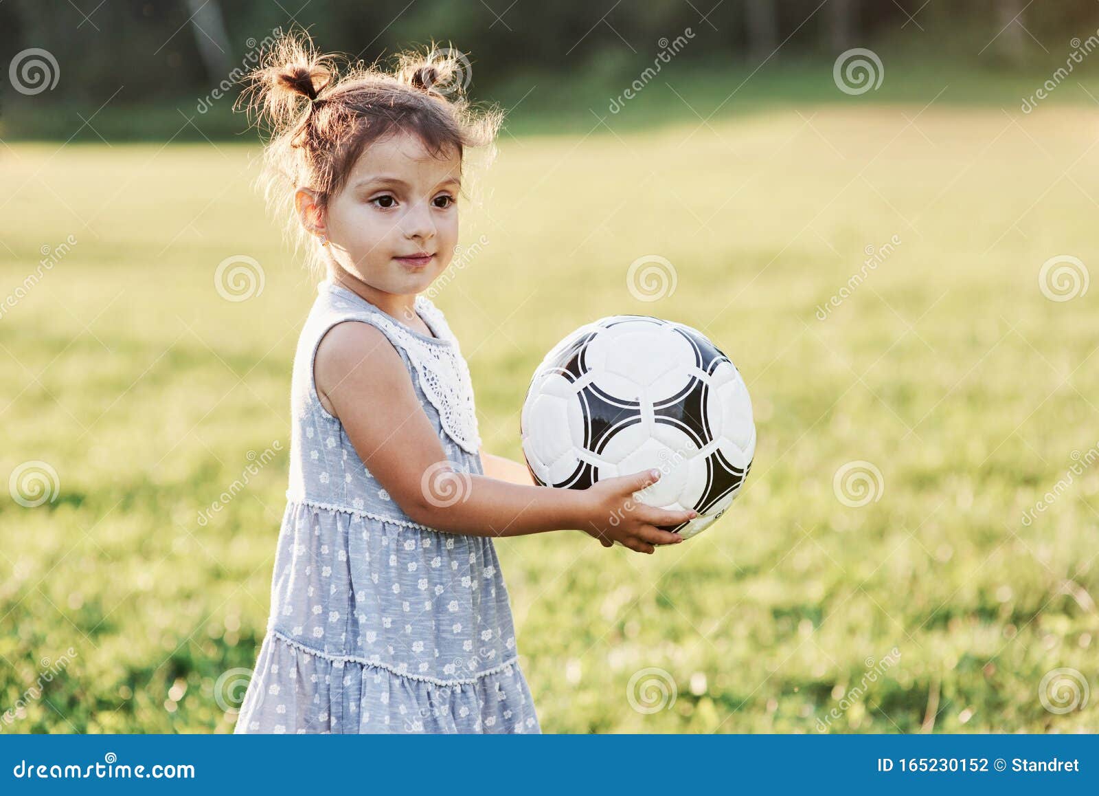 Concept of Sport. Adorable Little Kid Loves Soccer and All that is