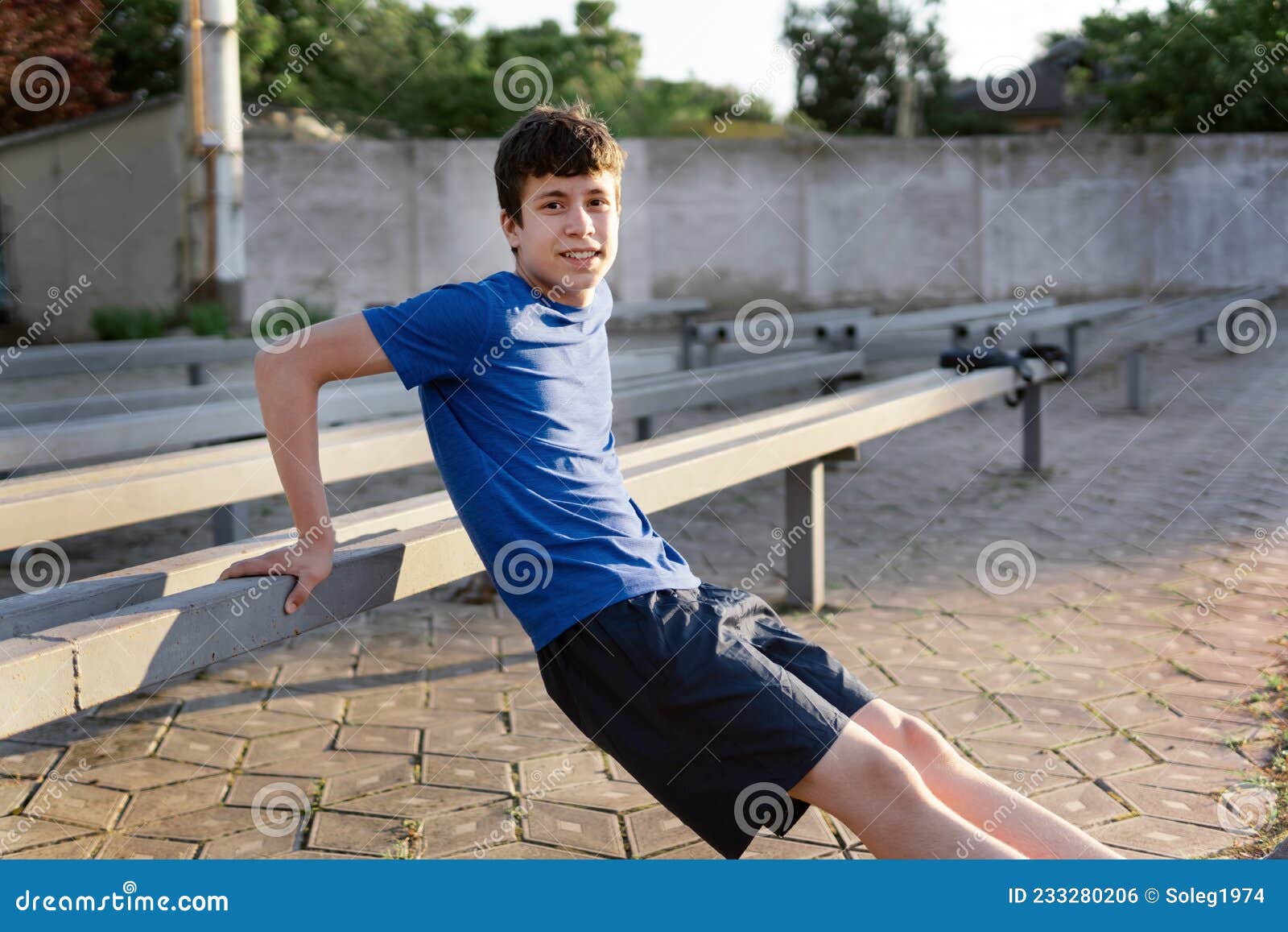 Concept of Sports and Health - Teen Boy Training and Pushups at the ...