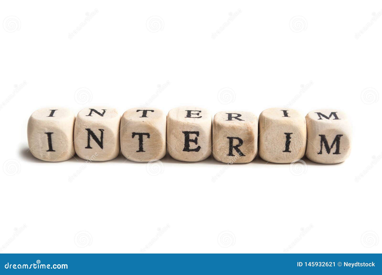 concept word on wooden cube - interim