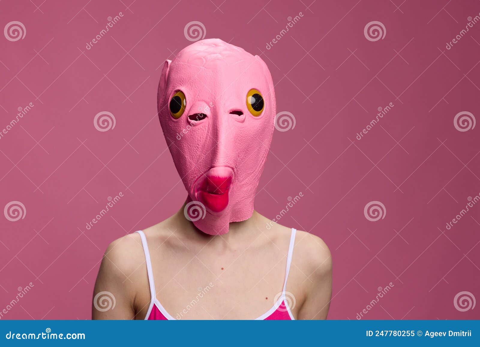 Conceptual Art Photo of a Woman in a Fish Mask for Halloween on a