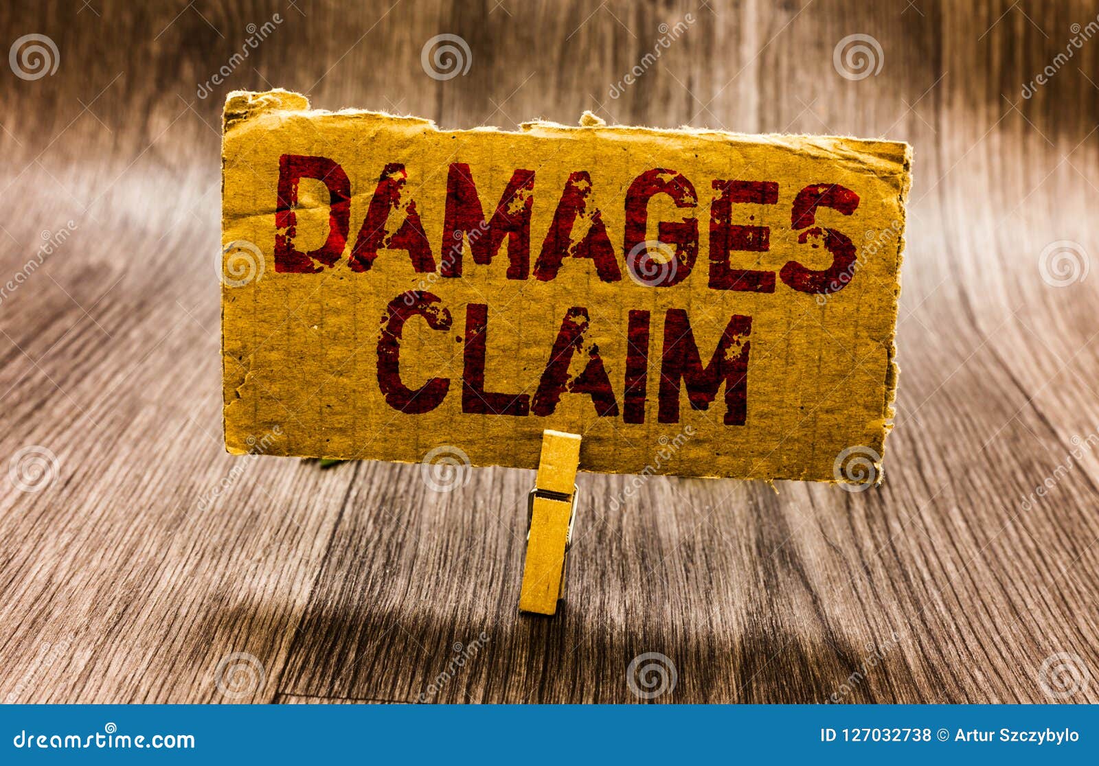 conceptual hand writing showing damages claim. business photo text demand compensation litigate insurance file suit