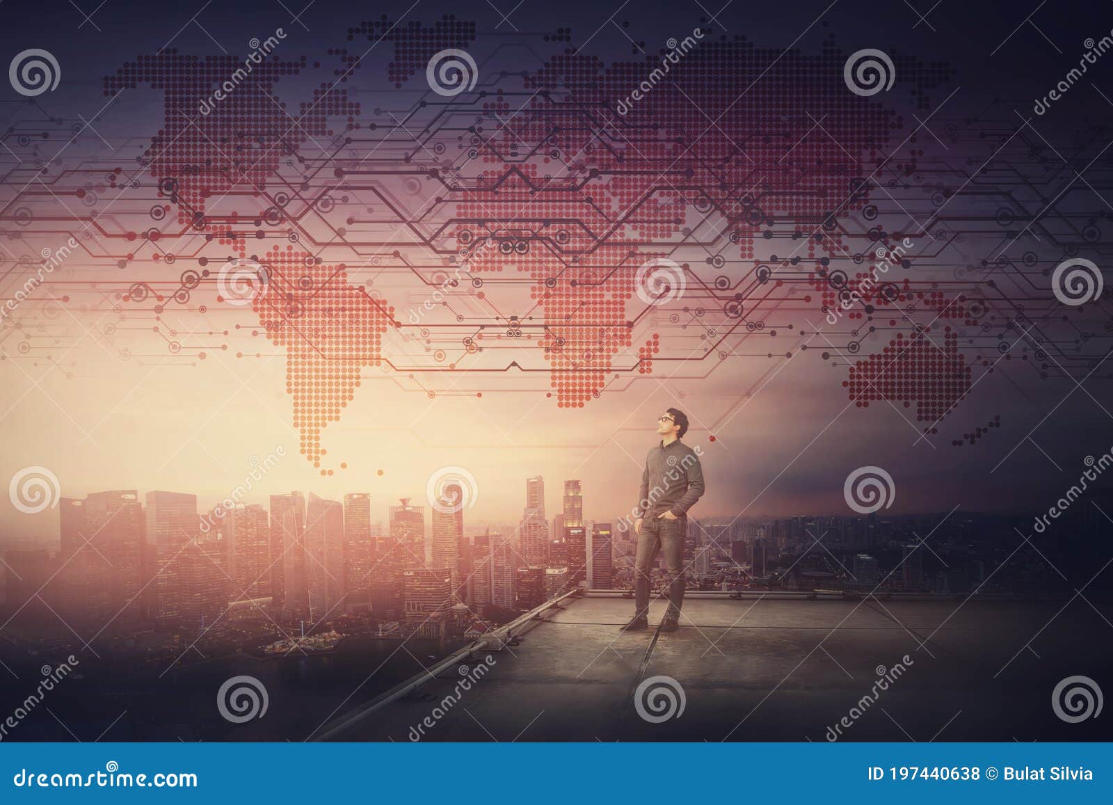 conceptual sunset scene with a businessman on the rooftop watching confident over the city horizon. digital world map exposed on