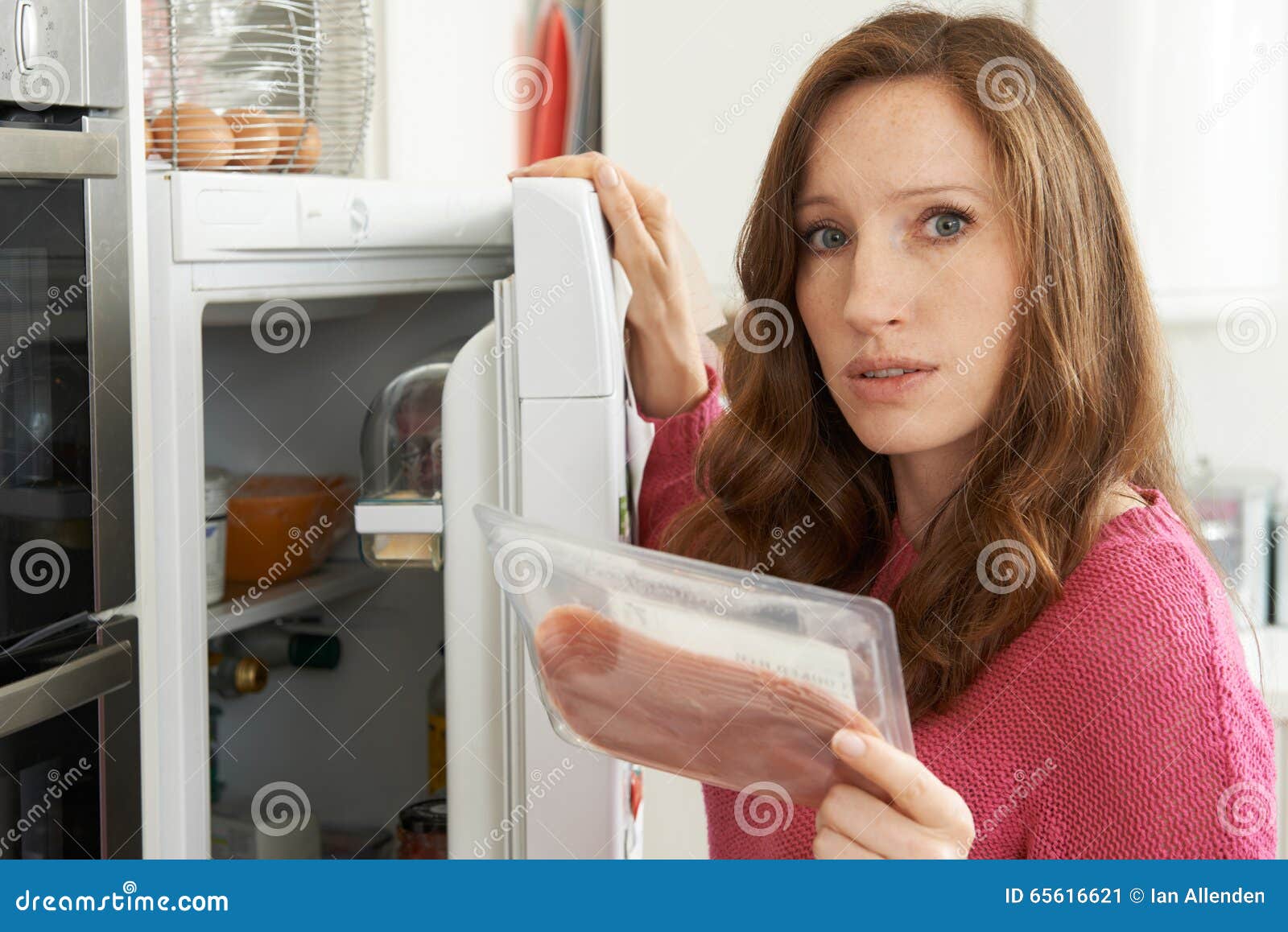 Concerned Woman Looking at Pre Packaged Meat Stock Image Image of