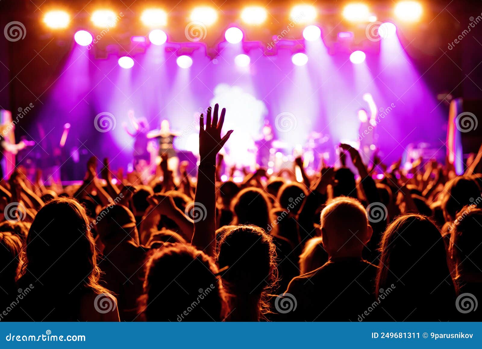 Concert Crowd Attending a Concert, People Silhouettes with Backlit by ...