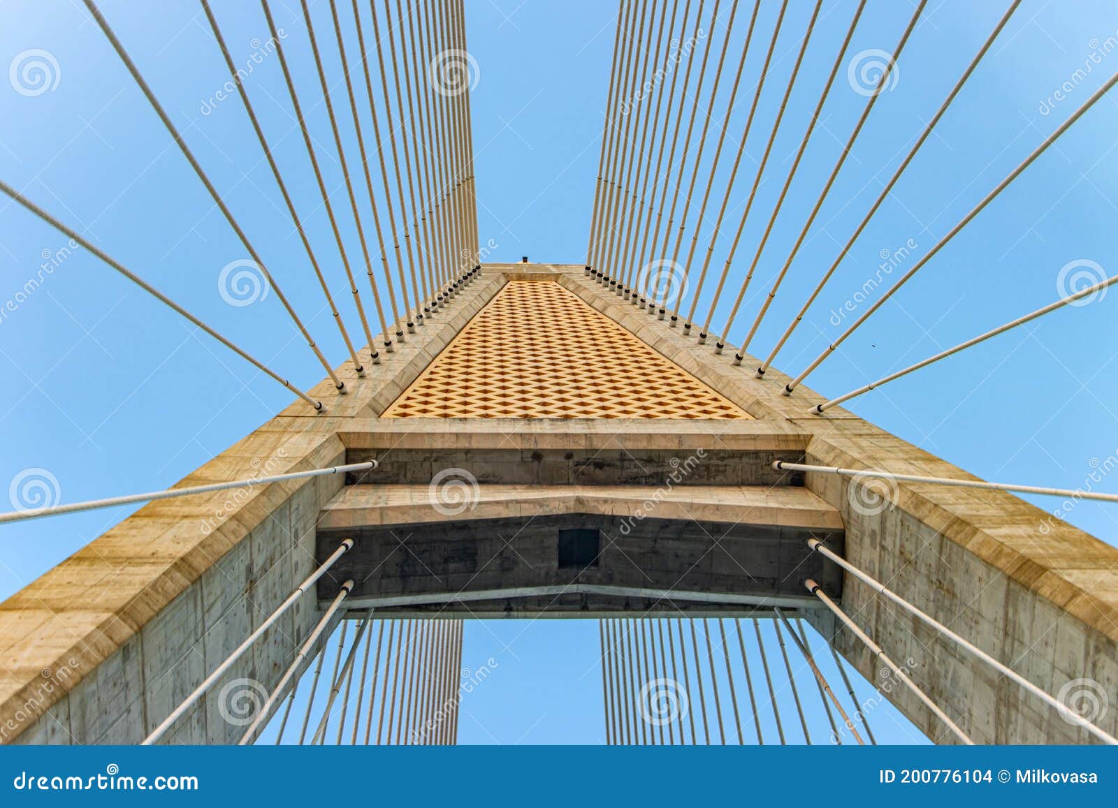 Concrete Bridge Pylon with Parallel Lines of Steel Cable. Stock Photo
