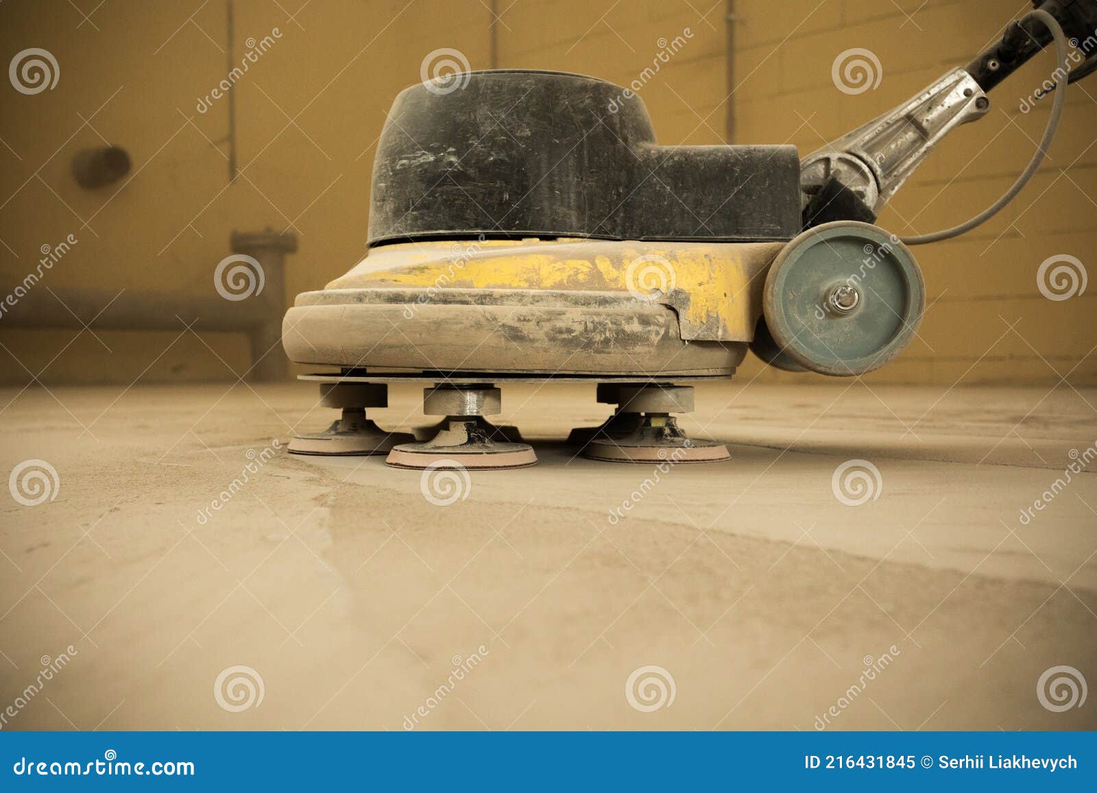Concrete Floor Grinding. Construction Process. Sanding a Concrete Floor