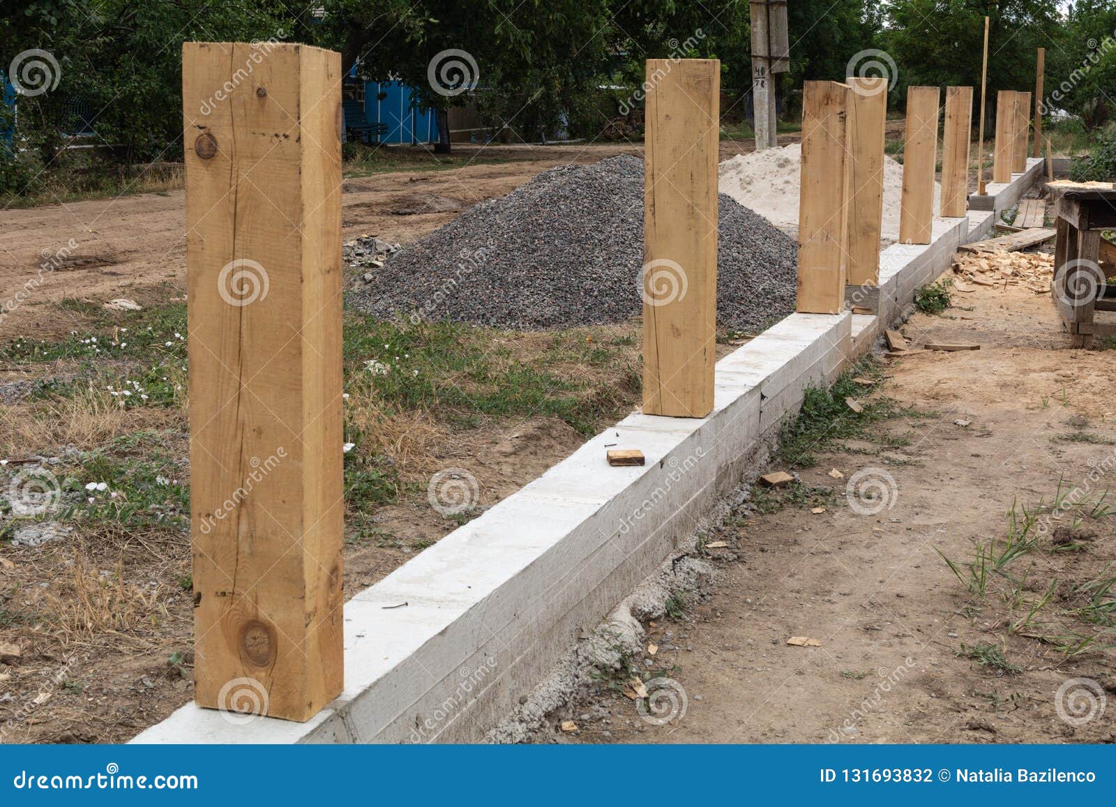 Concrete Foundation for Fence. Stock Photo - Image of retaining