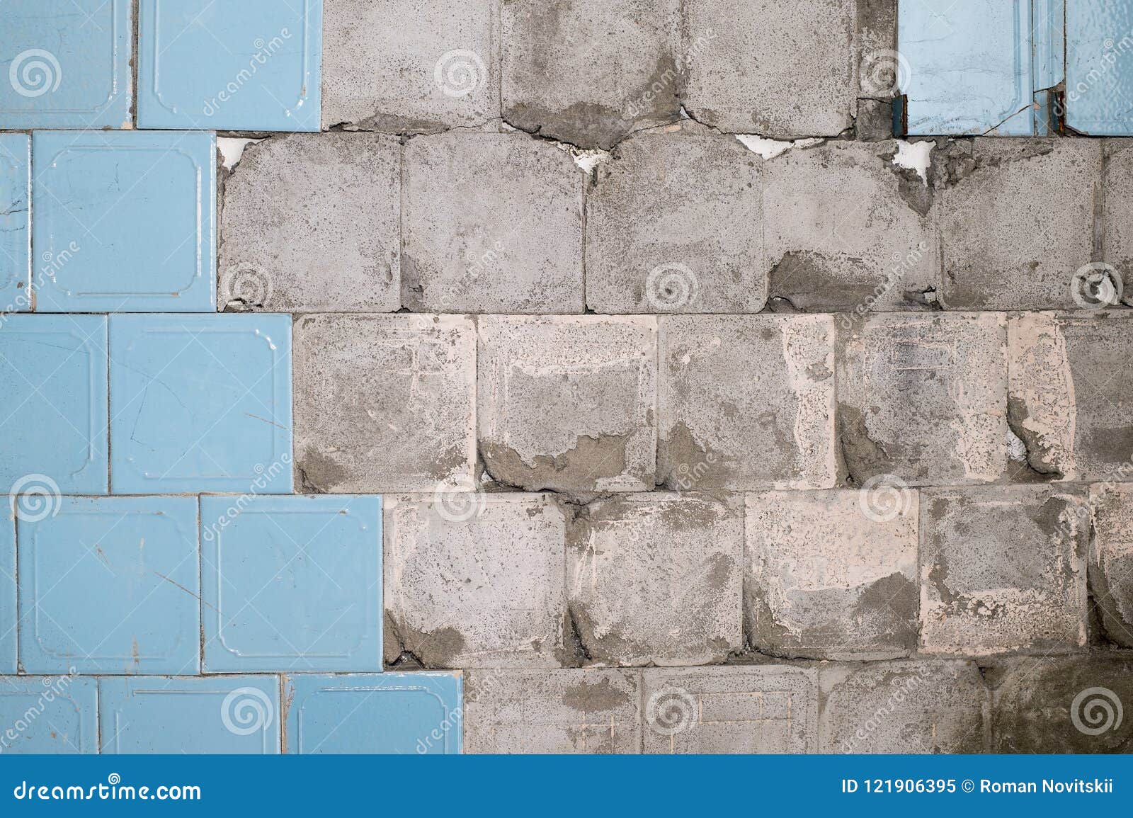 Concrete Old Wall with the Remains of Tiles and Tile Mortar. Background
