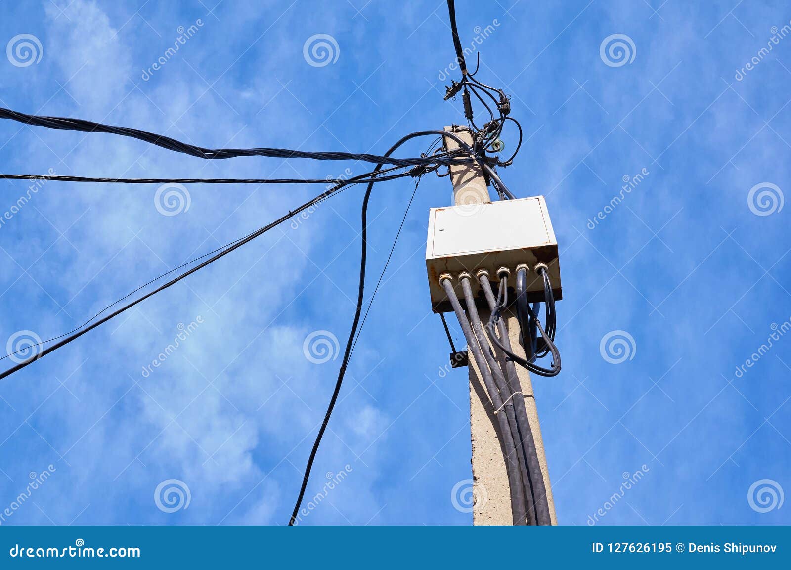 Concrete Pillar with Electrical Distribution Box and Wires. Stock Image